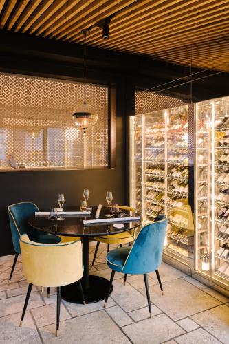 a dining room with a table and chairs at Hotel Ristorante Eurossola in Domodossola