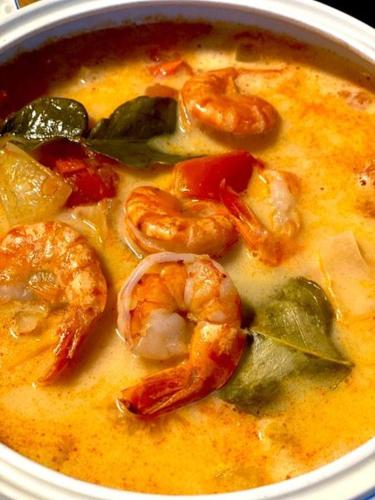 a bowl of soup with shrimp and other vegetables at Gasthaus Dernedde in Osterode