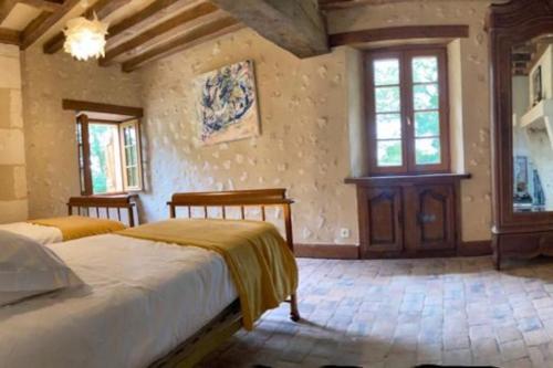 Krevet ili kreveti u jedinici u objektu La Gentillere “Ancien Ermitage”PNR du Perche 3 *
