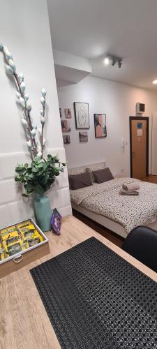 Ένα ή περισσότερα κρεβάτια σε δωμάτιο στο Apartman Delena
