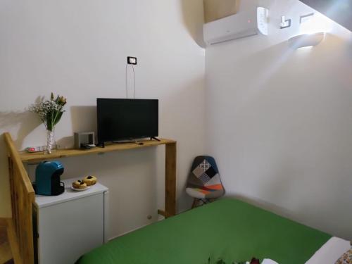 TV a/nebo společenská místnost v ubytování L'incanto salentino