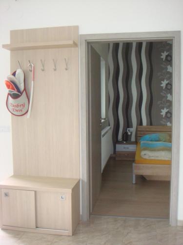 Ein Bett oder Betten in einem Zimmer der Unterkunft Apartmán Kurdějov