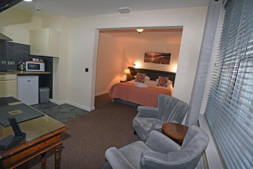 Kuchyň nebo kuchyňský kout v ubytování Ty Dre Town House