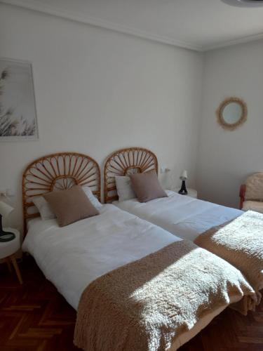 Postel nebo postele na pokoji v ubytování Terra Bardenas