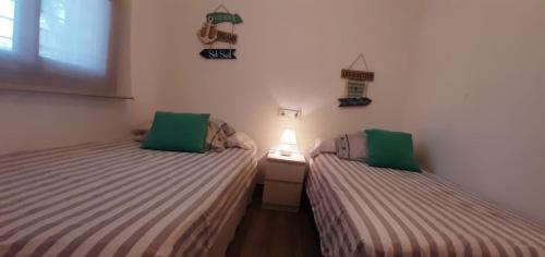 Giường trong phòng chung tại Casa Punta de Los Ingleses