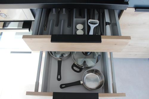 Kuchyň nebo kuchyňský kout v ubytování Apartament Fibra Freddo