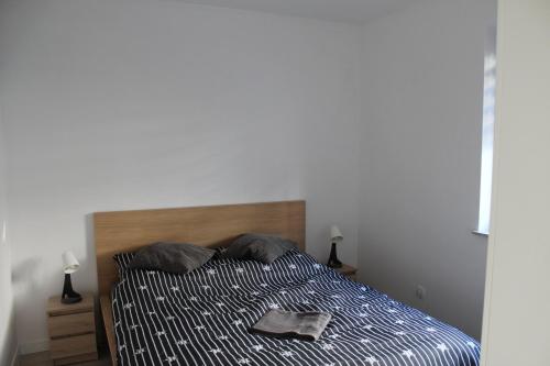 Postel nebo postele na pokoji v ubytování Apartament Fibra Freddo