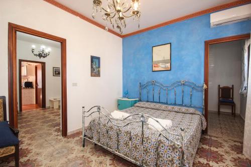 Postel nebo postele na pokoji v ubytování Casa Buscarini