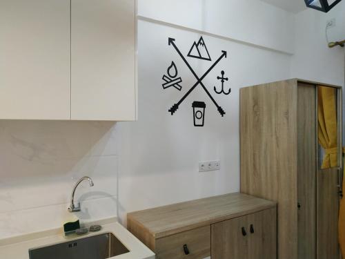 Kuchyň nebo kuchyňský kout v ubytování Apartemen Scandinavian 20m dengan 1 Kamar Tidur dan 1 Kamar Mandi di BSD Sky House BSD