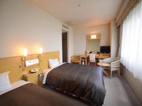 Postel nebo postele na pokoji v ubytování Hotel Bientos