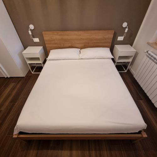 3 MURA roomsにあるベッド