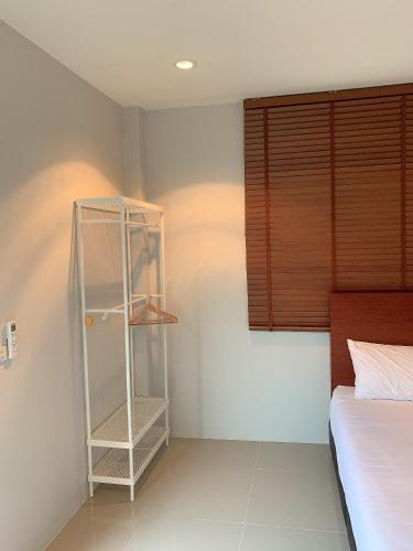 Katil atau katil-katil dalam bilik di กรณวรรณ รีสอร์ท