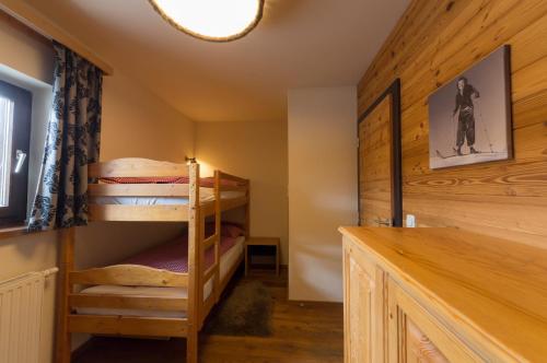 Ein Bett oder Betten in einem Zimmer der Unterkunft Almresort Baumschlagerberg