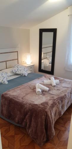 Postel nebo postele na pokoji v ubytování Apartamento ático en Sanxenxo a 160 m de Playa Silgar