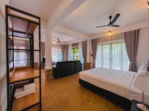 Ένα ή περισσότερα κρεβάτια σε δωμάτιο στο Villas Chaba