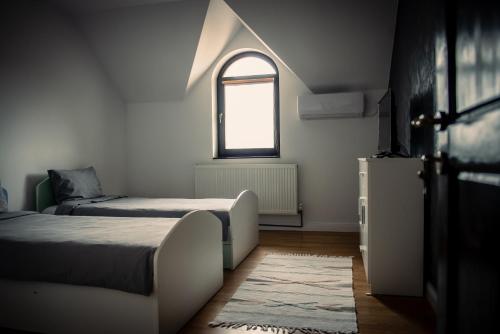 Кровать или кровати в номере Casa Murgulet