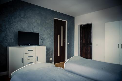 Кровать или кровати в номере Casa Murgulet