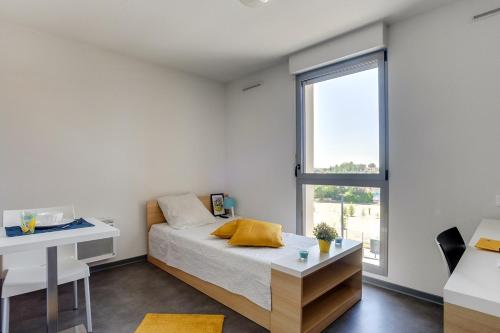 Postel nebo postele na pokoji v ubytování Apparteo Toulouse