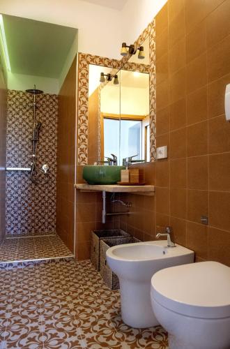 Ένα μπάνιο στο Appartamenti Podere San Sebastiano