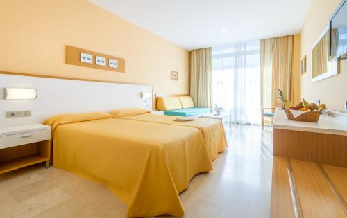 Postel nebo postele na pokoji v ubytování Hotel Mediterraneo
