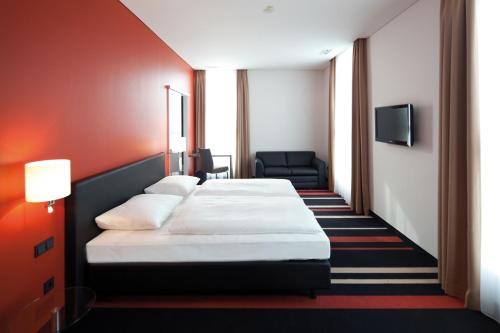 Posteľ alebo postele v izbe v ubytovaní enso Hotel