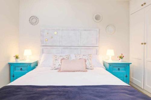 Posteľ alebo postele v izbe v ubytovaní La Favorita preciosa villa con piscina privada