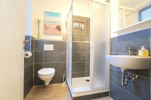 Un baño de Ferienwohnung ODIN am Schleswiger Dom