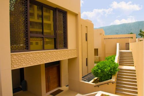 A balcony or terrace at ONE 4 Bedroom Luxury Villa