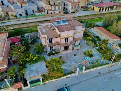 an aerial view of a house in a city at Villa Tripepi in Bova Marina