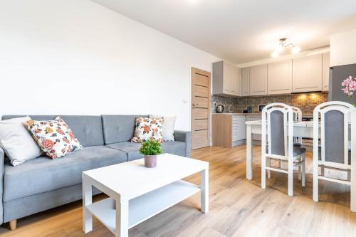 Kuchyň nebo kuchyňský kout v ubytování WrocApartments StarCenter - Parking Free