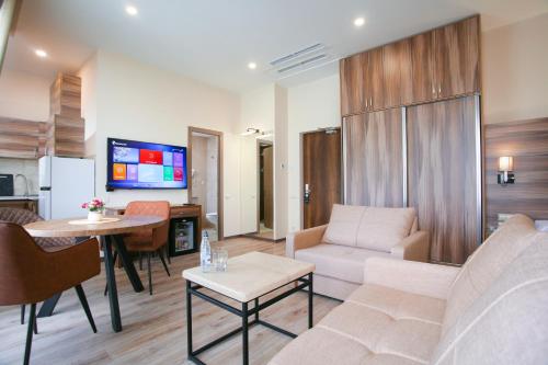 TV a/nebo společenská místnost v ubytování Nacho Hotel Yerevan