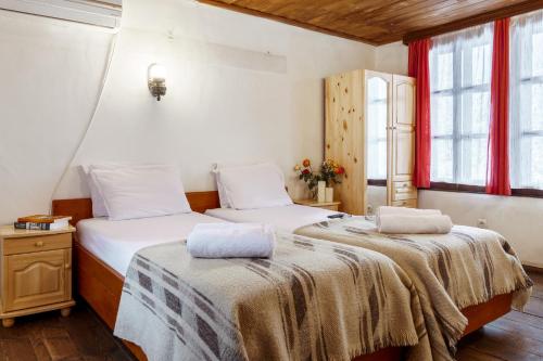 Postel nebo postele na pokoji v ubytování Guest house Maria Savekova 19 c.