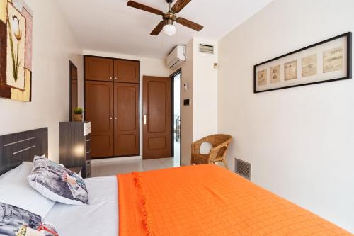 Ένα ή περισσότερα κρεβάτια σε δωμάτιο στο CASA OASIS