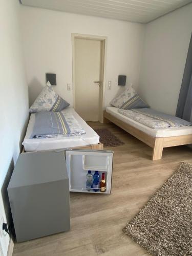 Privatzimmer Hoffmannにあるベッド