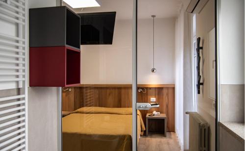 Un ou plusieurs lits dans un hébergement de l'établissement Hotel Oliva