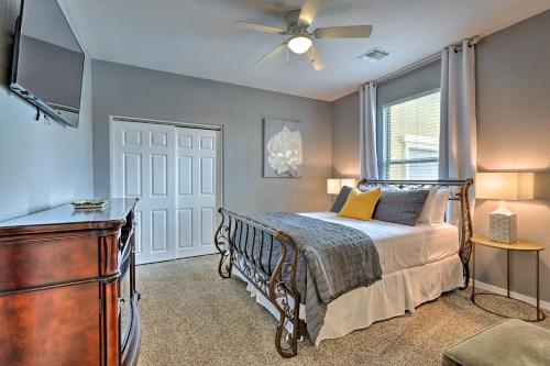 A bed or beds in a room at Bright Goodyear Retreat with Home Gym, Near Golfing