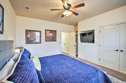 a bedroom with a bed and a ceiling fan at Grand Hot Springs Home Less Than 5 Mi to Lake Desoto! in Hot Springs Village