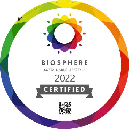 a colorful ribbon with the words biosphere sustainable infrastructure at Casa da Sicó in Manteigas