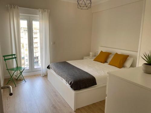 A bed or beds in a room at Xuloss Apartments 2