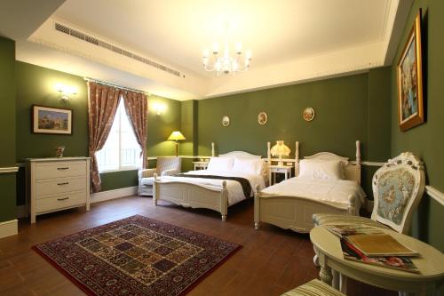 Una cama o camas en una habitación de Haut Rhin Villa