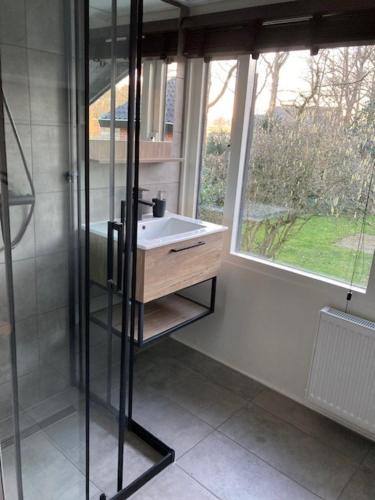 ห้องน้ำของ Achterhoekse vakantiewoning, infraroodsauna, geweldig uitzicht, goede bedden