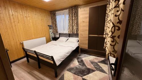 Säng eller sängar i ett rum på CVS Residence