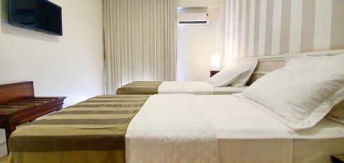 En eller flere senge i et værelse på Hotel Villa Mayor Charme - fortaleza