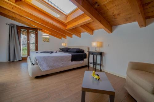 Ένα ή περισσότερα κρεβάτια σε δωμάτιο στο Maison Vespa
