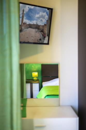 Postel nebo postele na pokoji v ubytování ELEROOM