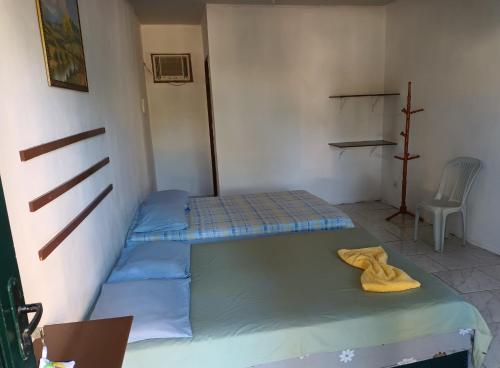 Cama ou camas em um quarto em Pousada Vale Do Aijalom
