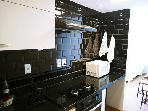 Dapur atau dapur kecil di Studio Copacabana 1