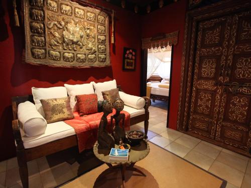 a living room with a couch and a table at Mai Tai Resort in Cassowary