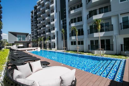 Πισίνα στο ή κοντά στο Mantra Beach Condominium Suite 2 - Mae Phim