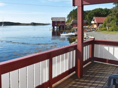 a view of a river from a balcony of a house at 6 person holiday home in Bud in Bud